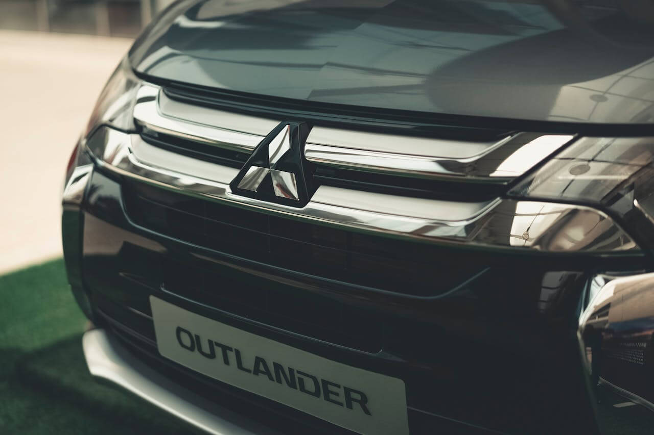 Mitsubishi logo on a car close-up